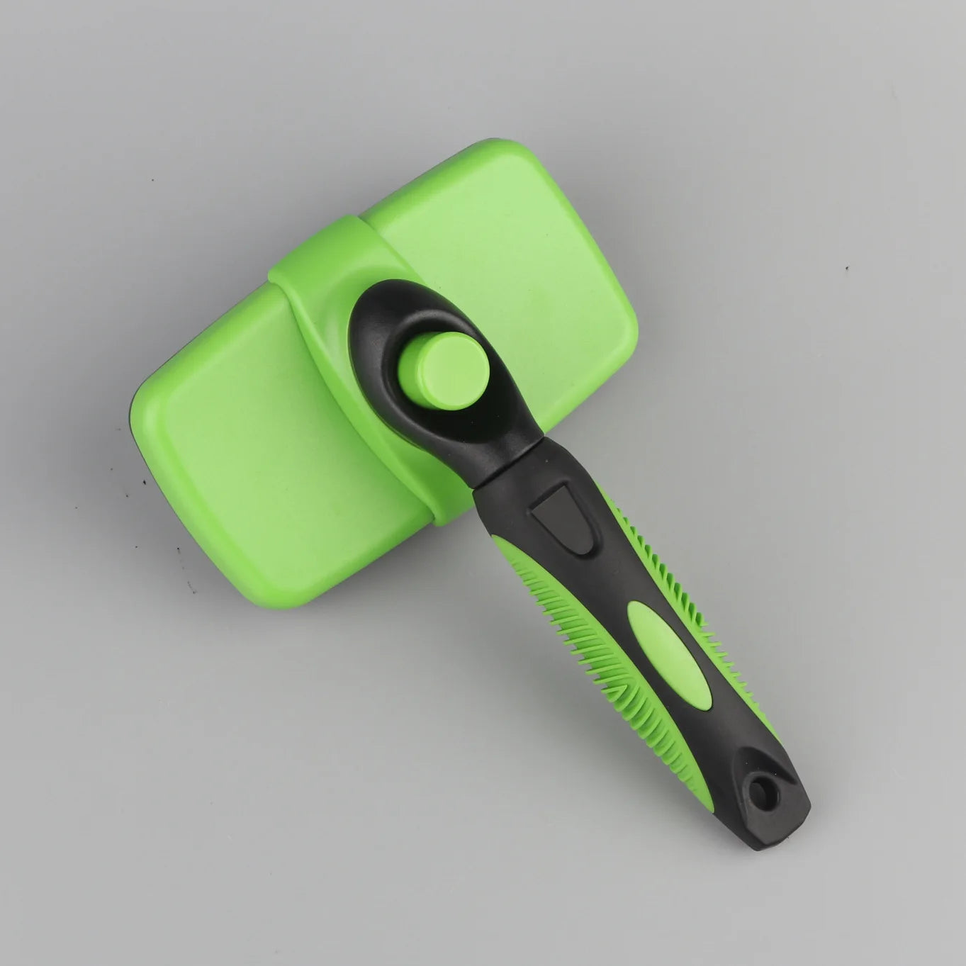 Brosse autonettoyante pour poils d'animaux